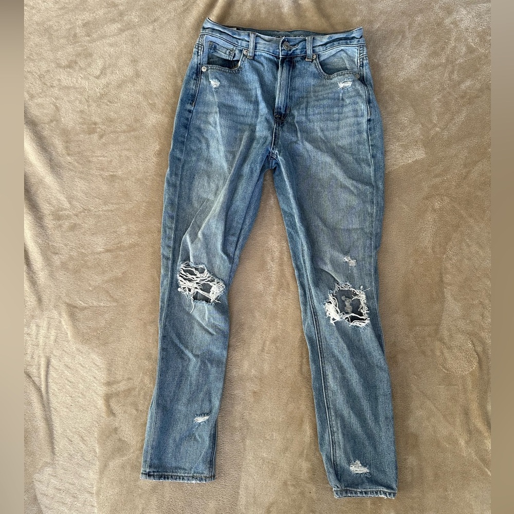 Blue High Rise Jeans
American Eagle
Size 0 Short